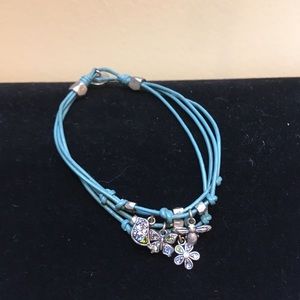 Fossil leather bracelet with charms